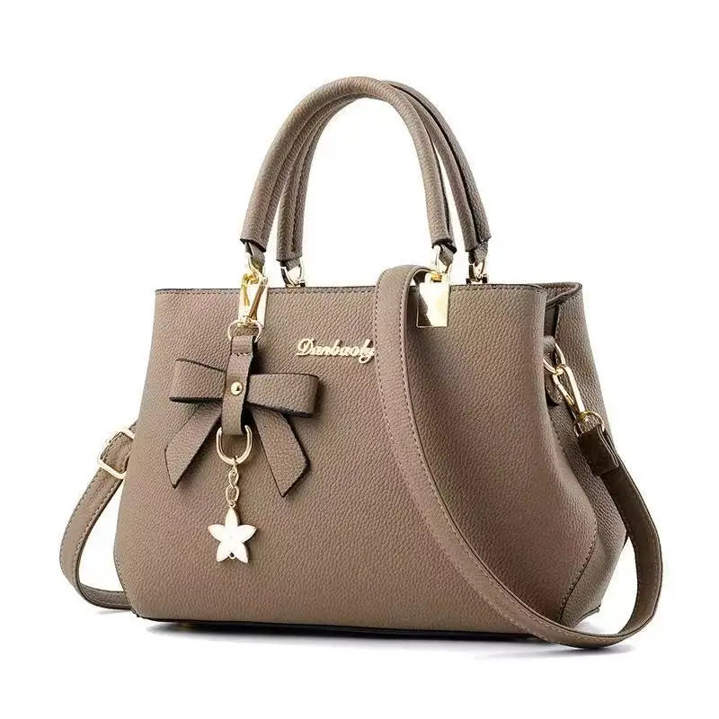 New Korean version trendy autumn and winter bow women's bag portable