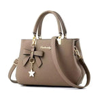 New Korean version trendy autumn and winter bow women's bag portable