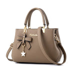New Korean version trendy autumn and winter bow women's bag portable